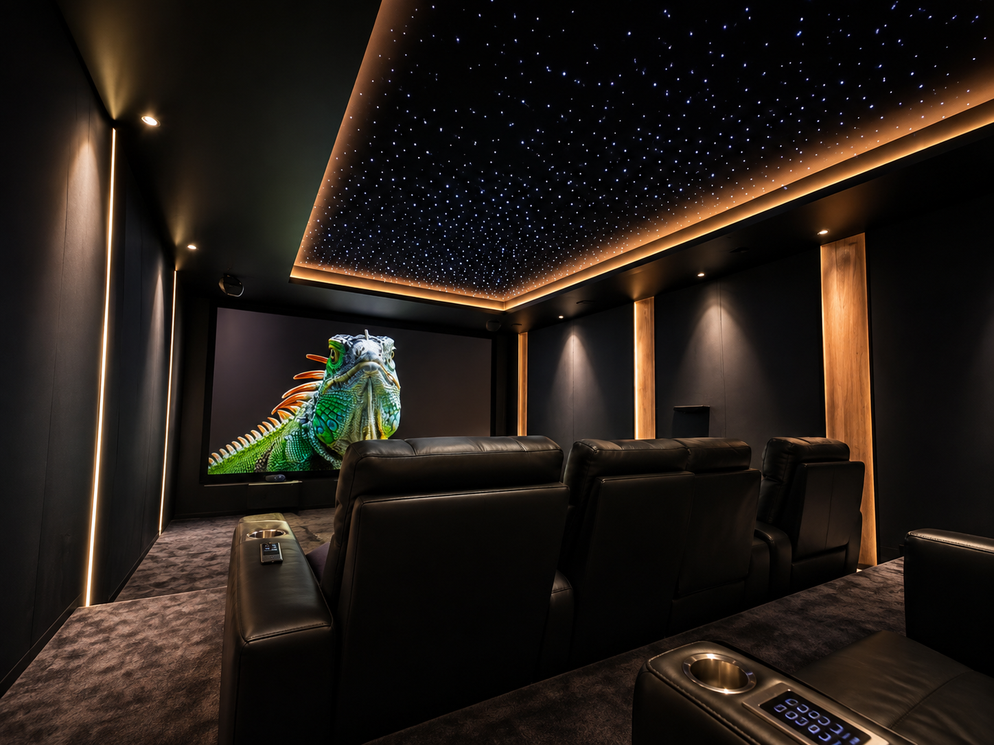 Private home cinema with starlit ceiling, recliner seating and integrated lighting control